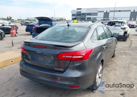 2016 Ford Focus Titanium from USA, damaged, VIN 1FADP3J29GL309415